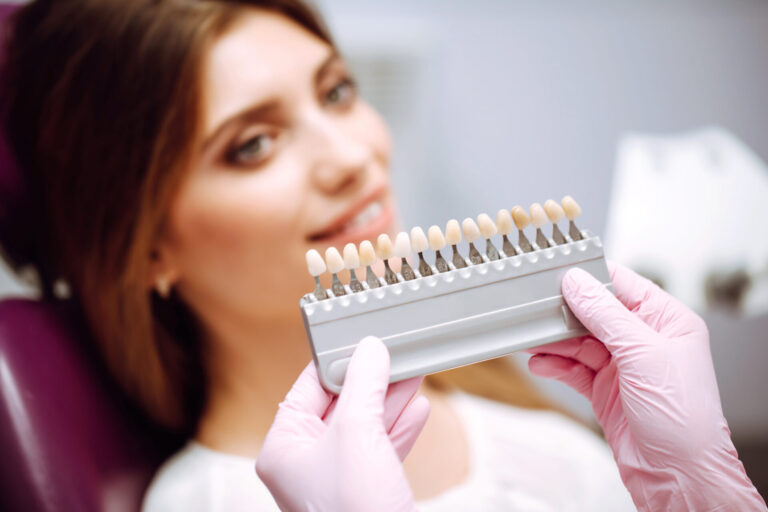Beautiful Woman Smile With Healthy Teeth Whitening. Matching Shades Of The Implants. Healthy Smile. Beautiful woman smile with healthy teeth whitening. Matching shades of the implants. Healthy Smile.