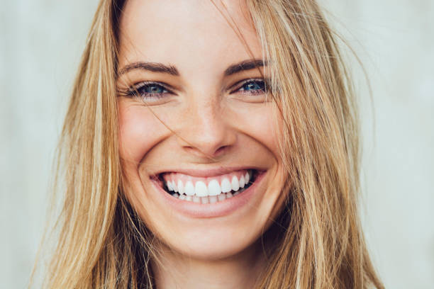 Portrait Of Young Woman With Beautiful Smile General Dentistry generic image of happy person